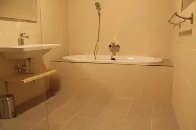 Ein Badezimmer in der Unterkunft Chalet Alte Mühle