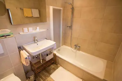 Ein Badezimmer in der Unterkunft Pension Landhaus Gasteiger