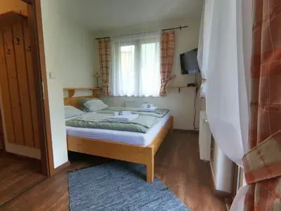 Ein Bett oder Betten in einem Zimmer der Unterkunft Pension Gemshorn