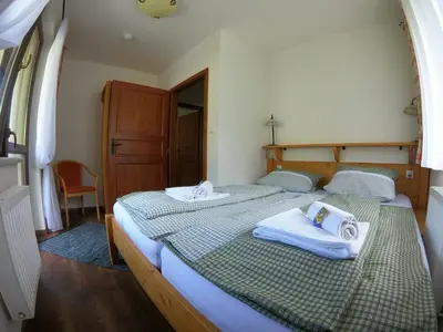 Ein Bett oder Betten in einem Zimmer der Unterkunft Pension Gemshorn
