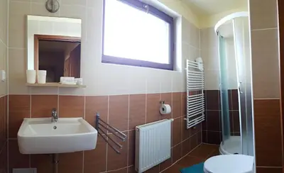 Ein Badezimmer in der Unterkunft Pension Gemshorn