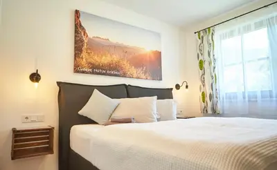 Ein Bett oder Betten in einem Zimmer der Unterkunft Hochwart Apartment - in der Nähe der Liftstation Schönleiten