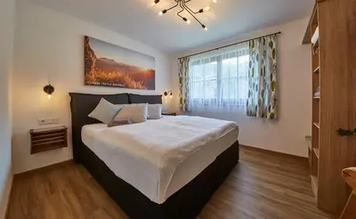 Ein Bett oder Betten in einem Zimmer der Unterkunft Hochwart Apartment - in der Nähe der Liftstation Schönleiten