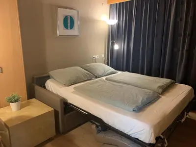 Ein Bett oder Betten in einem Zimmer der Unterkunft Sonnenalp Niederau