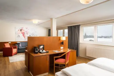 Ein Bett oder Betten in einem Zimmer der Unterkunft elaya hotel steinplatte, Trademark by Wyndham