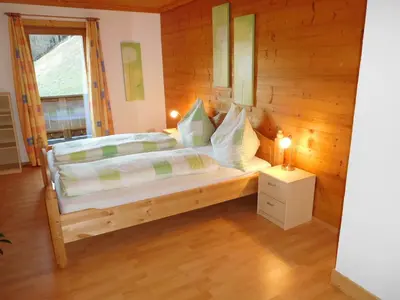 Ein Bett oder Betten in einem Zimmer der Unterkunft Apartment Aschaber