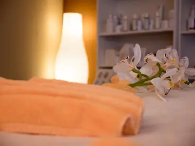 Ein Bett oder Betten in einem Zimmer der Unterkunft Berghotel Hochfügen