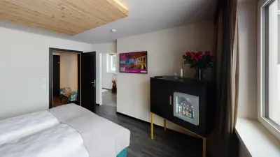 Ein Bett oder Betten in einem Zimmer der Unterkunft Hotel Panther'A
