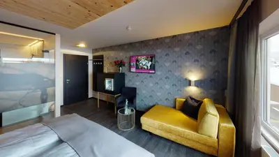 Ein Bett oder Betten in einem Zimmer der Unterkunft Hotel Panther'A