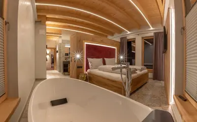 Ein Bett oder Betten in einem Zimmer der Unterkunft Appartement Zillertal Klee mit Restaurant KleemenTine
