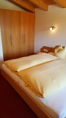 Ein Bett oder Betten in einem Zimmer der Unterkunft Glaserhof