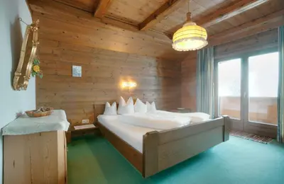 Ein Bett oder Betten in einem Zimmer der Unterkunft Gästehaus Grauss