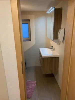 Ein Badezimmer in der Unterkunft Ferienwohnung Mauracher Kirer Haus
