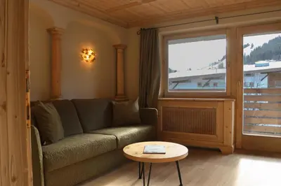 Ein Sitzbereich in der Unterkunft Hotel Alexander
