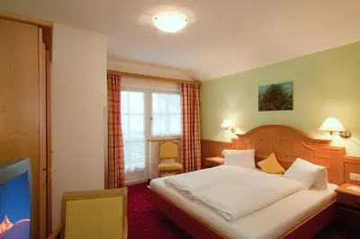 Ein Bett oder Betten in einem Zimmer der Unterkunft Hotel-Appartement Ferienhof