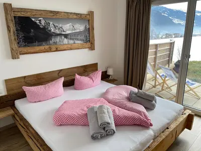 Ein Bett oder Betten in einem Zimmer der Unterkunft Chalet Fügen
