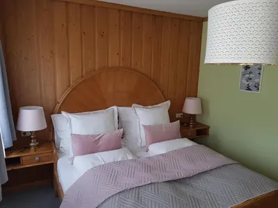 Ein Bett oder Betten in einem Zimmer der Unterkunft Pension Rangger