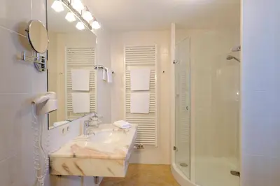 Ein Badezimmer in der Unterkunft Hotel Blattlhof