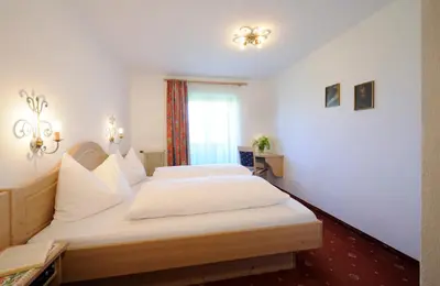 Ein Bett oder Betten in einem Zimmer der Unterkunft Hotel Blattlhof