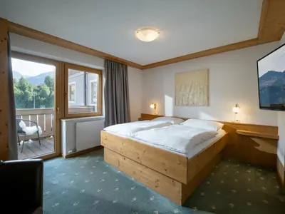 Ein Bett oder Betten in einem Zimmer der Unterkunft Gästehaus Gollner