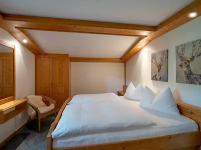 Ein Bett oder Betten in einem Zimmer der Unterkunft Gästehaus Gollner