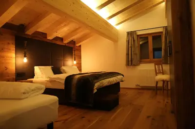 Ein Bett oder Betten in einem Zimmer der Unterkunft Chaletwohnung-Schustern