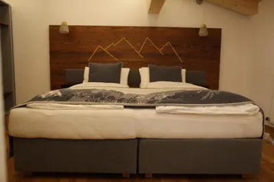 Ein Bett oder Betten in einem Zimmer der Unterkunft Chaletwohnung-Schustern