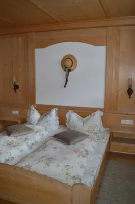 Ein Bett oder Betten in einem Zimmer der Unterkunft Haus Oblasser