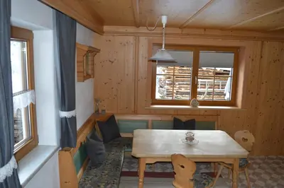 Ein Sitzbereich in der Unterkunft Haus Oblasser