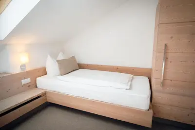 Ein Bett oder Betten in einem Zimmer der Unterkunft Landhaus Schösser-Brandler