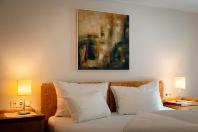 Ein Bett oder Betten in einem Zimmer der Unterkunft Landhaus Schösser-Brandler