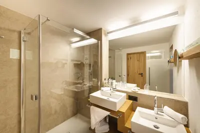 Ein Badezimmer in der Unterkunft Almhof Family und Wellness Resort