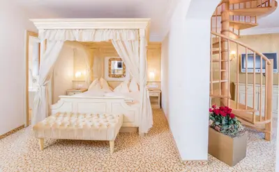 Ein Bett oder Betten in einem Zimmer der Unterkunft Der Lärchenhof