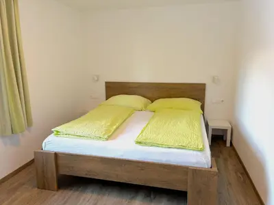 Ein Bett oder Betten in einem Zimmer der Unterkunft Apartment Benjamin by Interhome