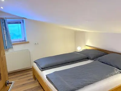 Ein Bett oder Betten in einem Zimmer der Unterkunft Apartment Daniel by Interhome
