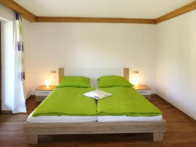 Ein Bett oder Betten in einem Zimmer der Unterkunft Apartment Haslinghof - PID235 by Interhome