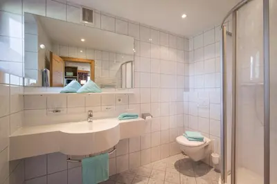 Ein Badezimmer in der Unterkunft Appartements Rofan