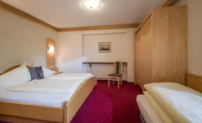 Ein Bett oder Betten in einem Zimmer der Unterkunft Appartements Rofan