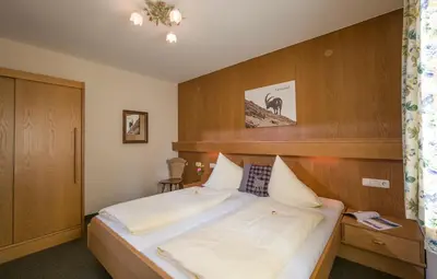 Ein Bett oder Betten in einem Zimmer der Unterkunft Appartements Rofan