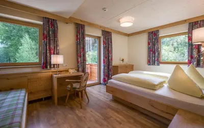 Ein Bett oder Betten in einem Zimmer der Unterkunft Appartements Rofan