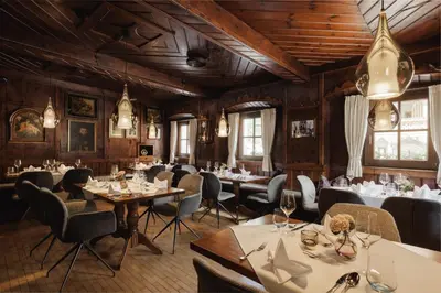 Ein Restaurant oder anderes Speiselokal in der Unterkunft PACHMAIR 1453 apart resort