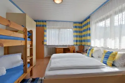 Ein Bett oder Betten in einem Zimmer der Unterkunft Ferienwohnungen Hauser
