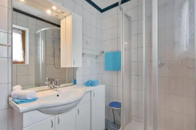 Ein Badezimmer in der Unterkunft Ferienwohnungen Hauser