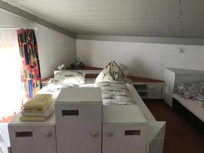 Ein Bett oder Betten in einem Zimmer der Unterkunft Appartments Haus Rettenmoser