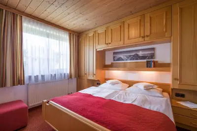 Ein Bett oder Betten in einem Zimmer der Unterkunft Appartementhaus Mühlberger