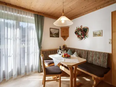 Ein Sitzbereich in der Unterkunft Appartementhaus Mühlberger