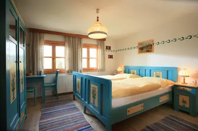 Ein Bett oder Betten in einem Zimmer der Unterkunft Bergpension Zinting