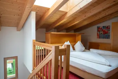 Ein Bett oder Betten in einem Zimmer der Unterkunft Aparthotel Schindlhaus/Alpin