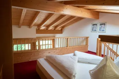 Ein Bett oder Betten in einem Zimmer der Unterkunft Aparthotel Schindlhaus/Alpin