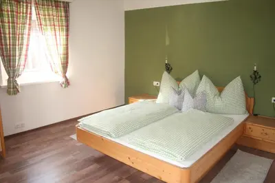 Ein Bett oder Betten in einem Zimmer der Unterkunft Landhaus Eder